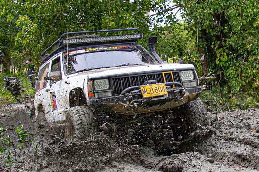 Pickup truck with all-terrain tires on a rugged Ontario trail